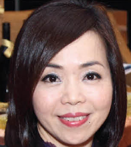 黃少英女士